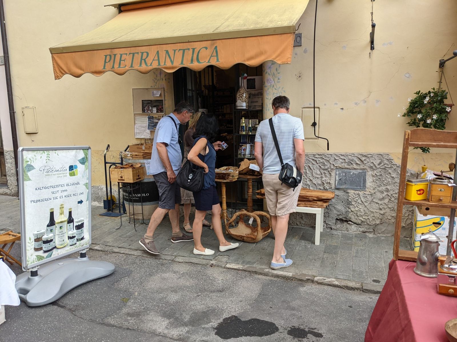 The Pietrantica shop in Dolcedo with people browsing outside