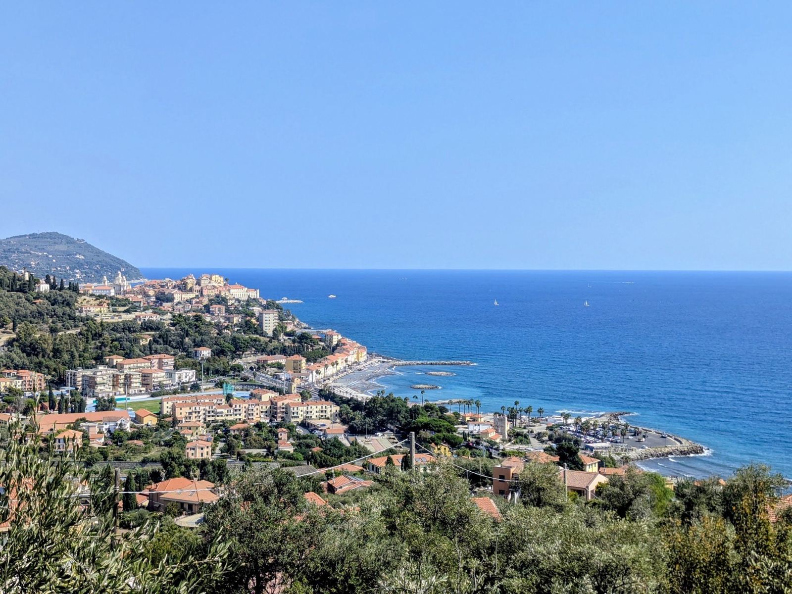 The Ligurian coast and Porto Maurizio seen from the hills, the sea deep blue