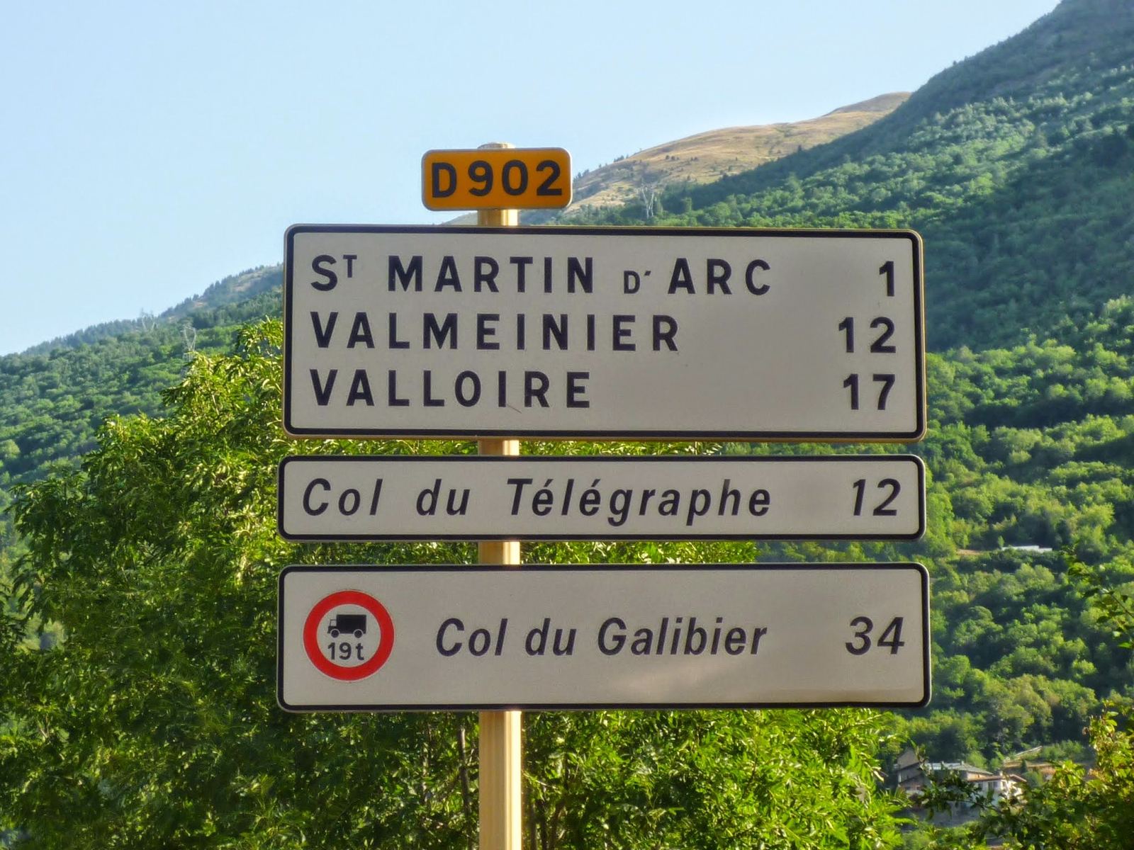 Road signs on the D902: Valloire 17, Col du Télégraphe 12, Col du Galibier 34