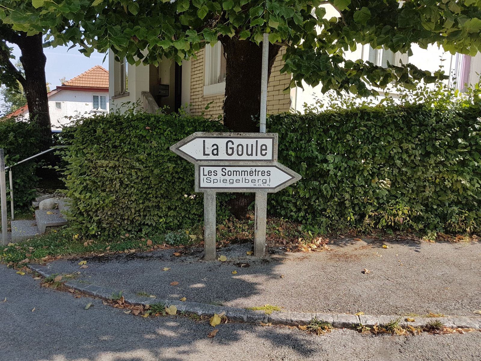 A road sign for La Goule on the edge of Le Noirmont