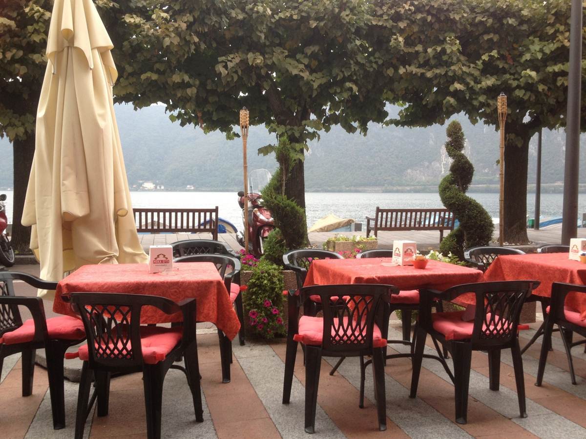 A lakeside restaurant terrace on Lake Lugano