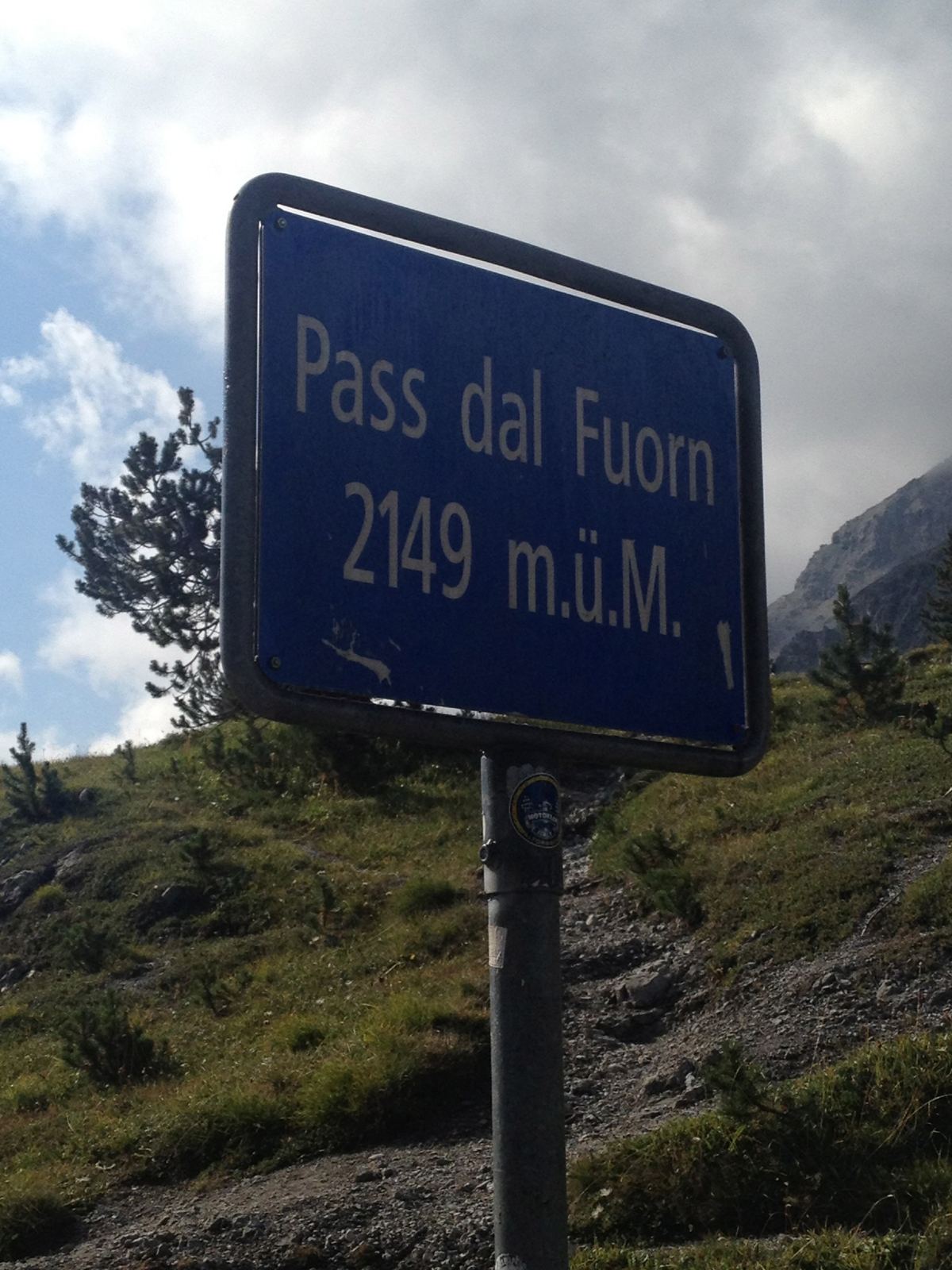 The blue sign at the top of the Pass dal Fuorn, 2,149m